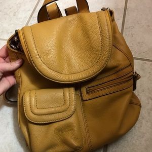 Mustard-yellow Tignanello backpack. Barely used